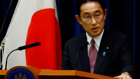 Getty Images Japan's Prime Minister Fumio Kishida speaks at a news conference in Tokyo on March 3, 2022.