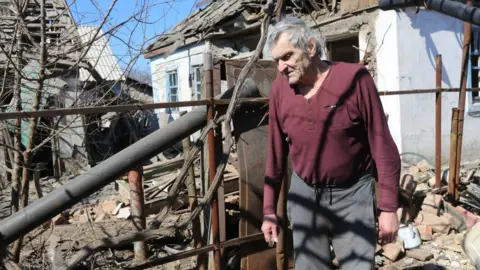 Getty Images A view of destruction after missile attacks hit Petrovsky district in the pro-Russian separatists-controlled Donetsk in Ukraine on March 21, 2022.