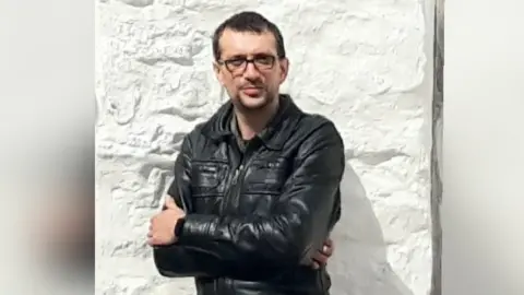 FAMILY PHOTO Mark Pullin (family photo) He was last seen alive leaving Ysbyty Glan Clwyd's emergency department in the early hours of the morning