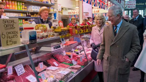 WPA Pool/Getty Images Prince Charles and Camilla at Halifax Borough Market in 2018