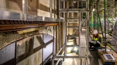 Manchester City Council Woman working on Manchester Town Hall renovation
