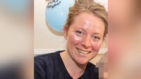 Jonathan Goldberg A still of Jemma Mitchell smiling