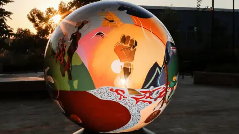 Paul Fears Mother Africa globe