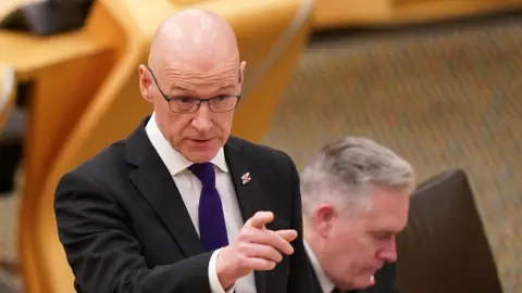 PA Media John Swinney