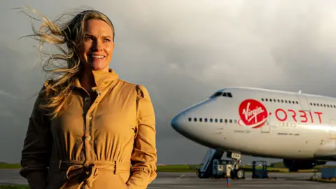 PA Media Melissa Thorpe next to the 747 that will be used in launches.