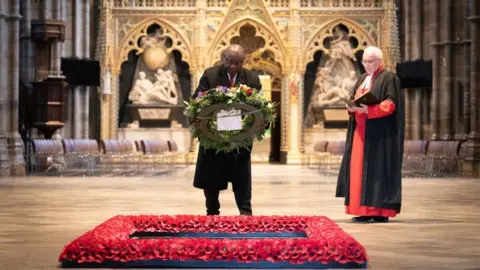 PA Media Mr Ramaphosa lays a wreath at the Tomb of the Unknown Warrior in Westminster Abbey