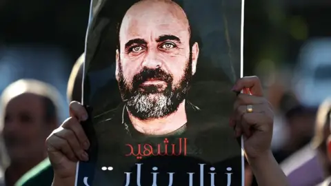 AFP File photo showing a protest against the Palestinian Authority in Ramallah in the occupied West Bank on 2 August 2021, following the death in custody of activist Nizar Banat