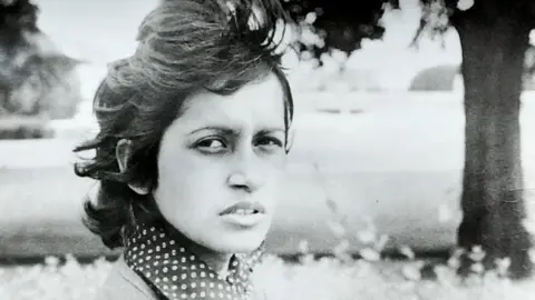 Van Dunem family Woman in black and white