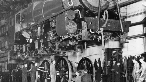 Getty Images Crewe Works, 17 January 1946. London, Midland & Scottish Railway's wheeling class 5, 4-6-0 steam locomotive being assembled.