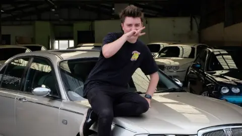 Tom Cowling Tom Cowling on a Rover in Longbridge