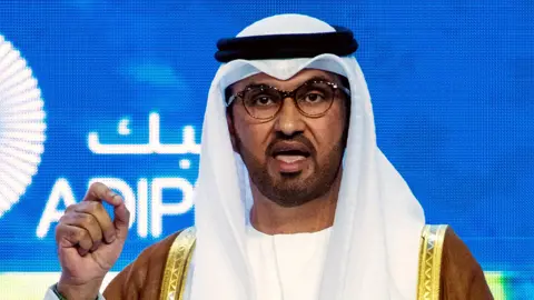 Getty Images Sultan al-Jaber, speaking at the Abu Dhabi International Petroleum Exhibition in October 2023