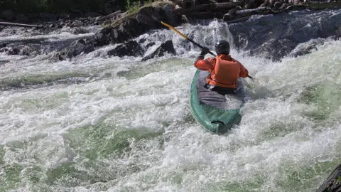 Thinkstock A kayaker on the river