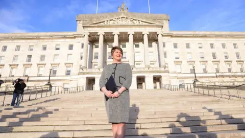 Pacemaker Arlene Foster on the steps of Stormont on her first day as first minister of Northern Ireland