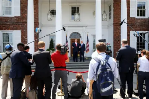 Reuters A velvet rope separates reporters from the man with the nuclear codes