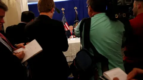Reuters pool reporters film trump