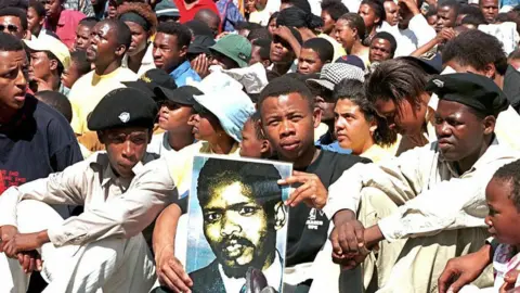 AFP Some of the over10,000 people attended the unveiling of the statue of Black Consciousness (BC) leader Steve Biko, who died in police detention in 1977, in East London city centre 12 September, 1997. In his address at the unveiling, President Nelson Mandela praised Biko for his contribution in the fight for freedom.