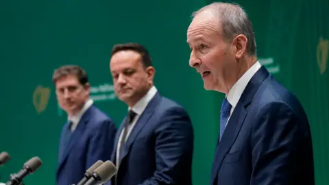 PA Micheál Martin, Leo Varadkar and Eamon Ryan address the media in Dublin