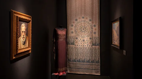 Archivio Fotografico Fondazione Musei Civici di Venezia/ Marcello Venturini A portrait of the legendary couturier is exhibited alongside his work (Credit: Archivio Fotografico Fondazione Musei Civici di Venezia/ Marcello Venturini)