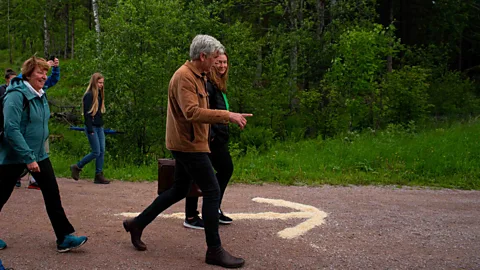 Future Library/Jola McDonald Author Karl Ove Knausgaard leads the procession – secret manuscript in hand – followed by Oslo's mayor (Credit: Future Library/Jola McDonald)