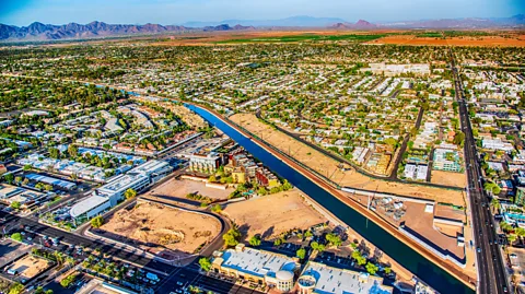 Art Wager/Getty Images The canals that criss-cross Phoenix allow millions of people to live in the sun-baked desert (Credit: Art Wager/Getty Images)