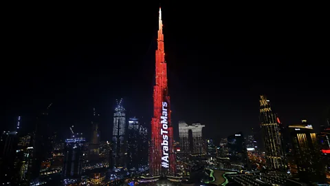 Giuseppe Cacace/Getty Images The Burj Khlaifa was lit in red as the UAE’s Mars mission grew closer to entering orbit (Credit: Giuseppe Cacace/Getty Images)