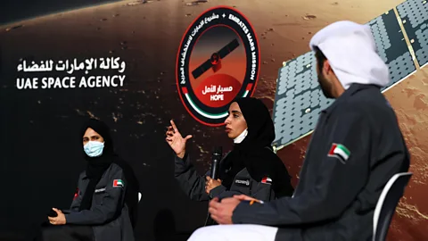 Francois Nel/Getty Images Hessa Al Matroushi (centre) is now the science lead for the Hope mission, uncovering new insights into Martian weather (Credit: Francois Nel/Getty Images)