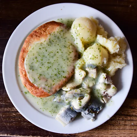 Sergio Amiti/Getty Images Pie with liquor and jellied eel can be still found on the menu at London's eel and pie houses (Credit: Sergio Amiti/Getty Images)