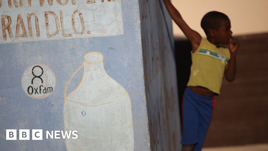 Oxfam agrees to withdraw government funding bids Oxfam agrees to withdraw government funding bids