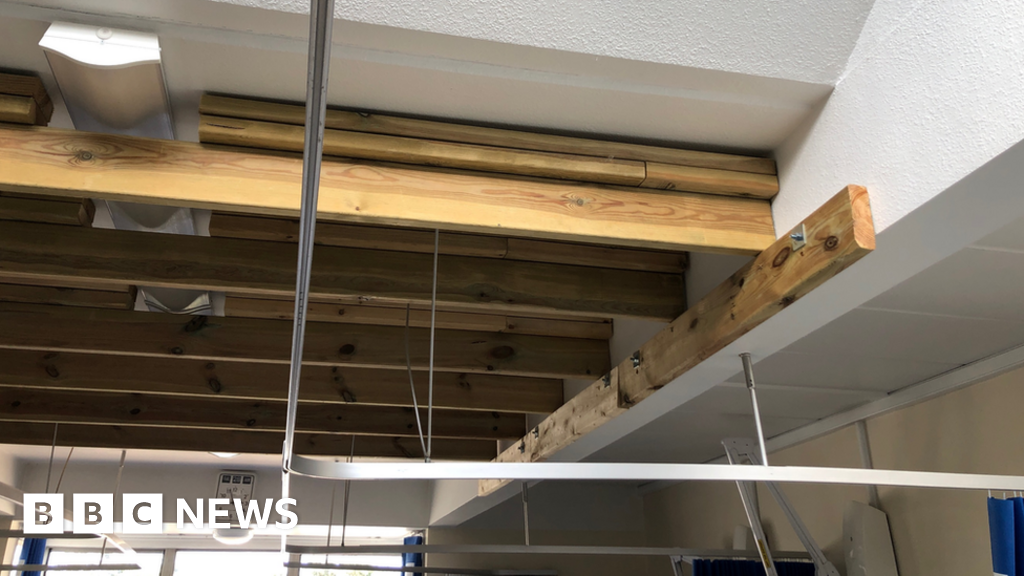 Propped-up hospital makes bucket plan to catch rain