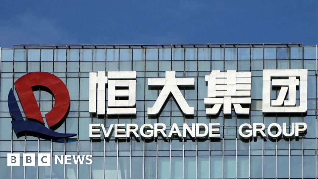 China police detain staff at Evergrande wealth unit