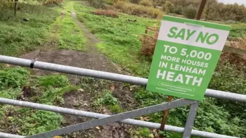 LDRS/Simon Finlay Sign placed by campaigners trying to stop housing developments at  Lenham