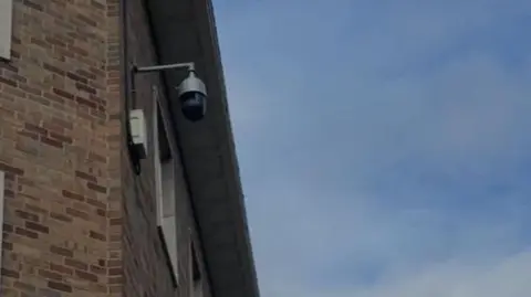 BBC CCTV camera on side of building