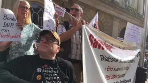 BBC Protesters outside Northamptonshire County Council