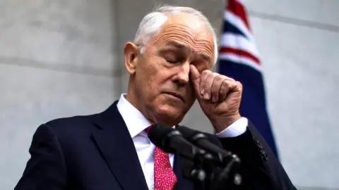 AFP Malcolm Turnbull rubs his eye