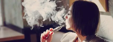 Getty Images Woman vaping