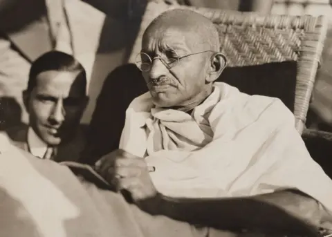 Daily Herald Archive/Getty Images Mahatma Gandhi pictured on board the SS Rajputana in 1931