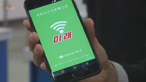 KCTV An Arirang 171 smartphone being used to access "Mirae" during a science fair