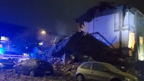 Andy Phillips Collapsed building