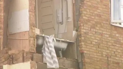 Remains of collapsed building