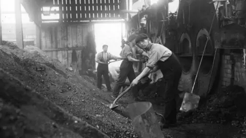 Getty Images/Topical Press Agency Miners in Wigan in 1912