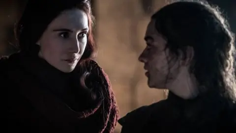 HELEN SLOAN/HBO Melisandre and Arya