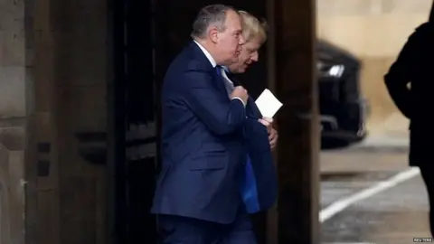 Reuters Boris Johnson walking alongside fellow Conservative MP Conor Burns