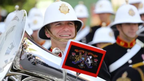 EPA Bandsmen from the Royal Marines marched through Salisbury with smiles on their faces
