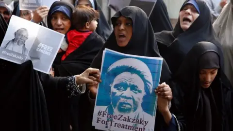 Inpho Protesters hold placard and shout slogans demand to release the Nigerian Ibrahim Zakzaky, next to the Nigeria embassy in Tehran, Iran, 17 July 2019. in December 2015