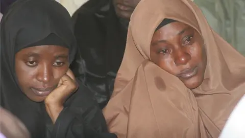 AFP Shi-iites sect women reacts during a peaceful protest over illegal detention of El-Zazzaky and children in Kaduna, Nigeria on 5th January, 2016.