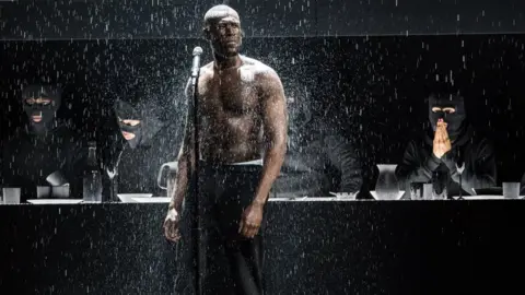 Getty Images Stormzy on stage at BRITs