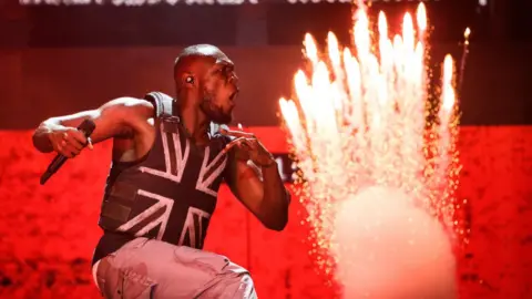 Getty Images Stormzy on stage at Glastonbury