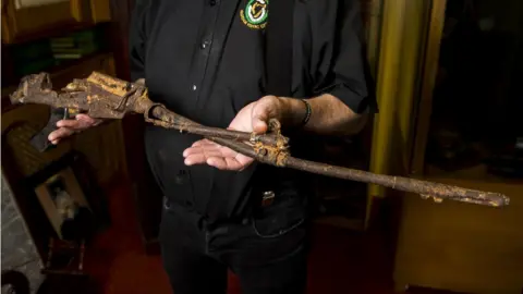 Liam McBurney/PA The damaged rifle