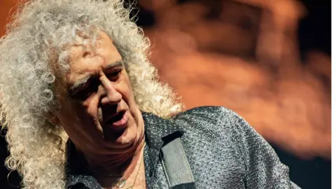 AFP/Getty Images Queen guitarist Brian May