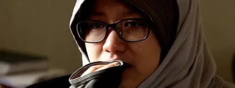 Nada Fedulla cries as she asks her home country, Indonesia, to take her back.